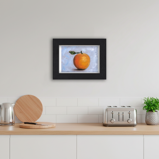 Black Framed Orange Giclee Art Print in Kitchen