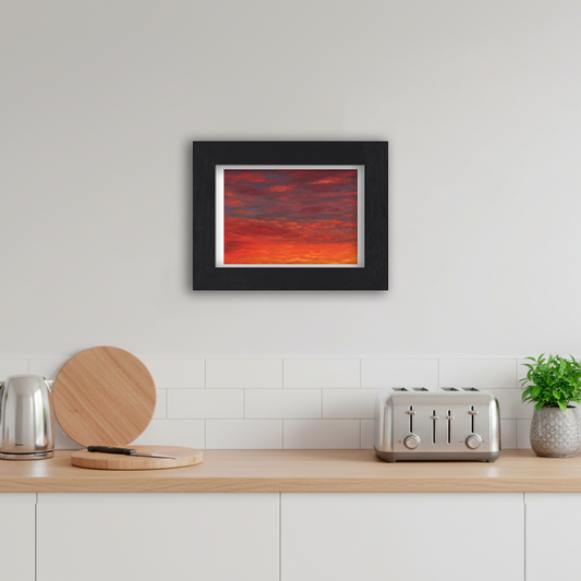 Black Framed Sunset Giclee Art Print in Kitchen
