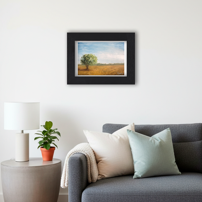 Black Framed Tree in a Field Giclee Art Print in Living Room