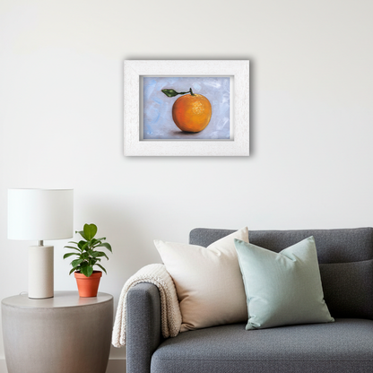 White Framed Orange Giclee Art Print in Living Room